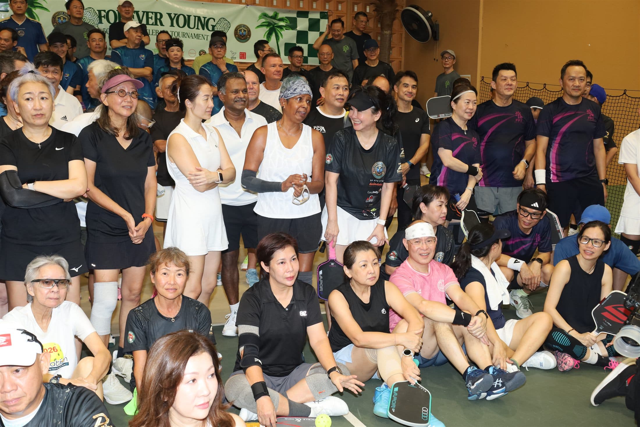 Members and spectators gathered courtside