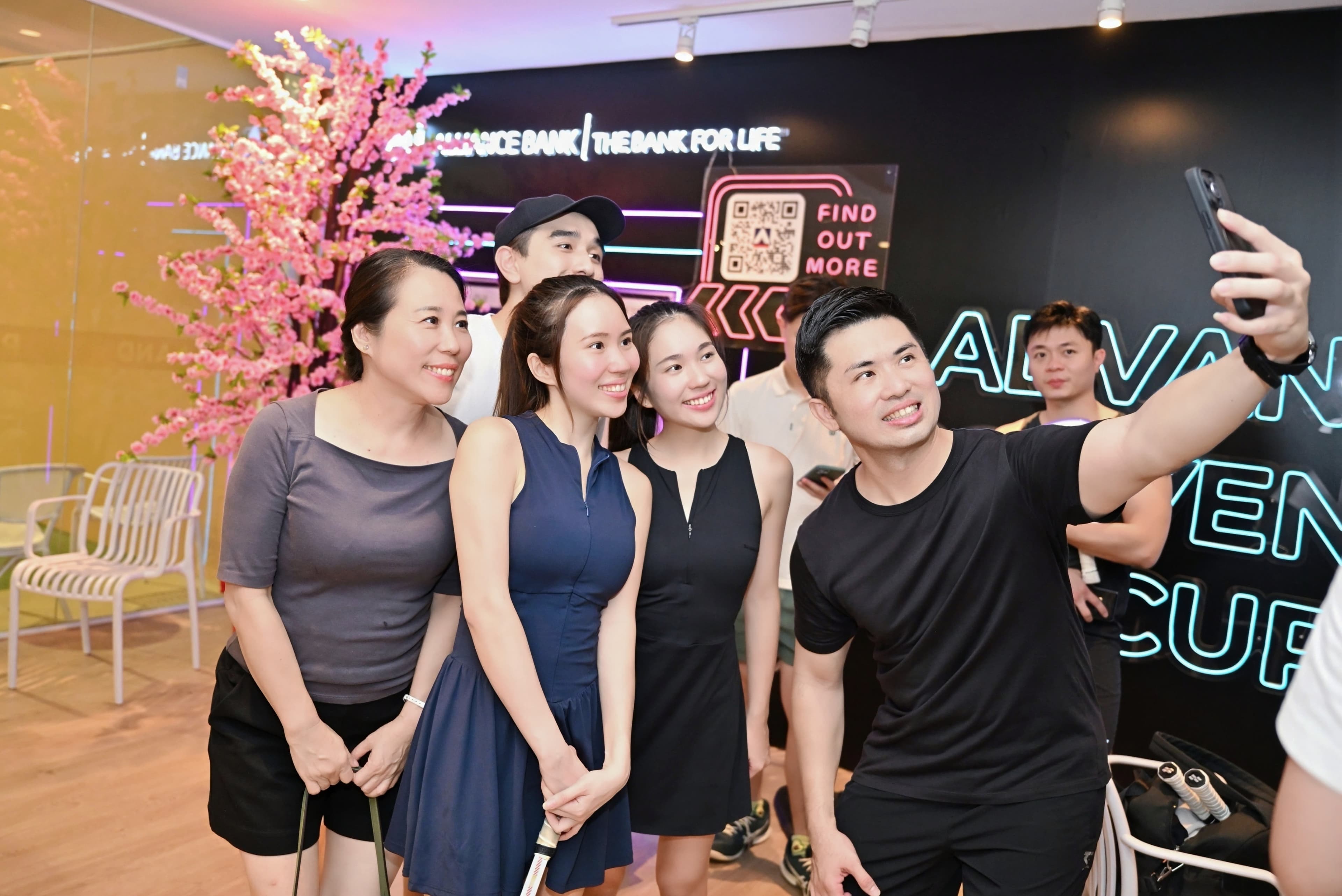 CEO Sports Club guests taking a group selfie