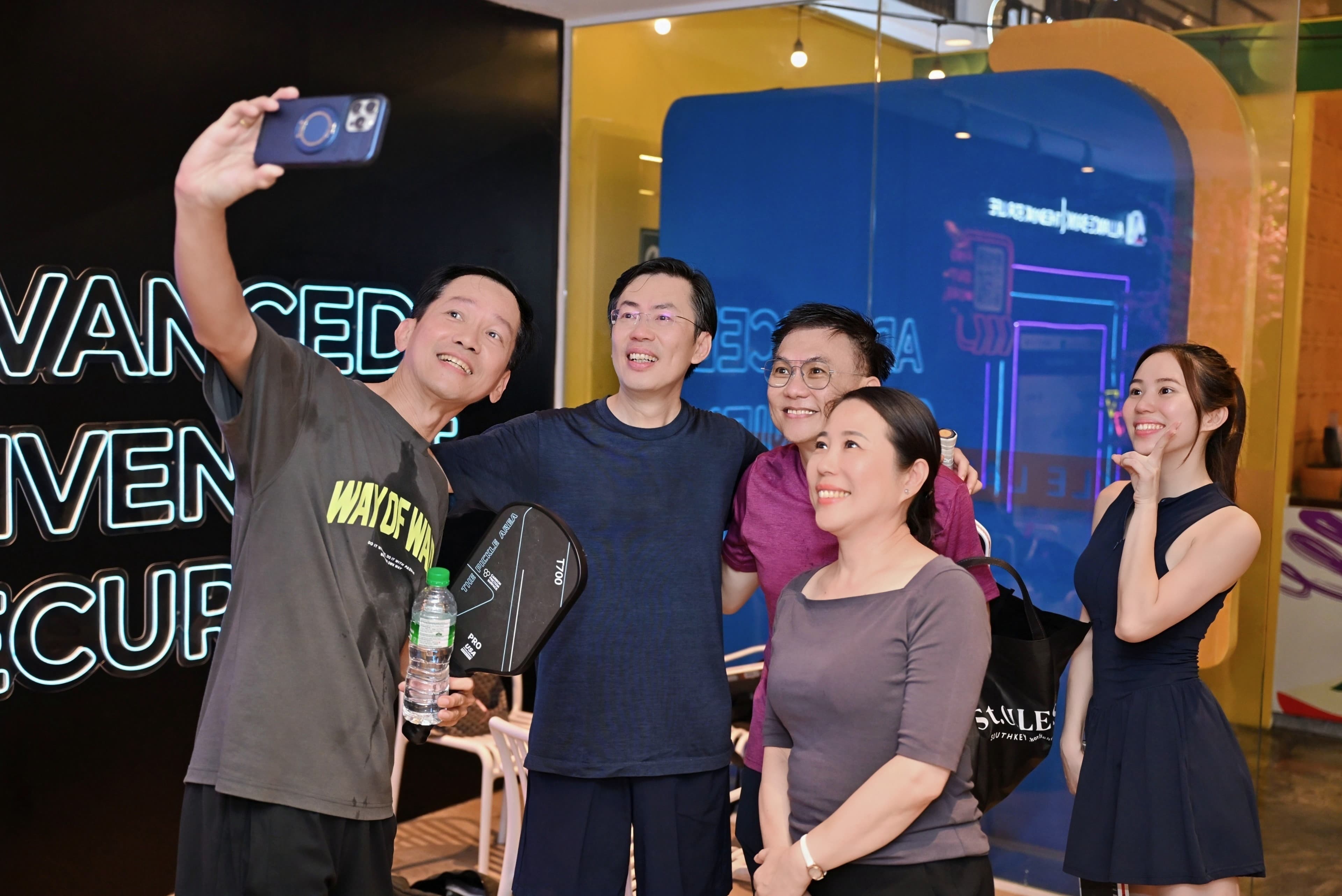 CEO Sports Club guests taking photos after the session