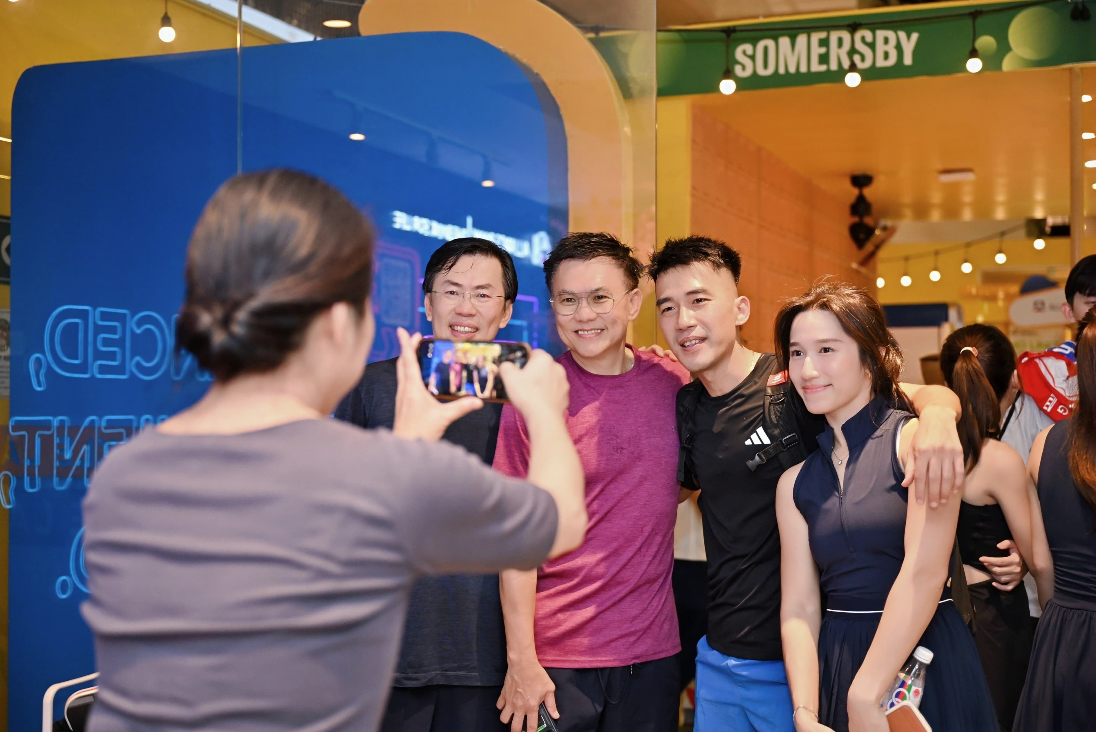 CEO Sports Club guests posing for a photo