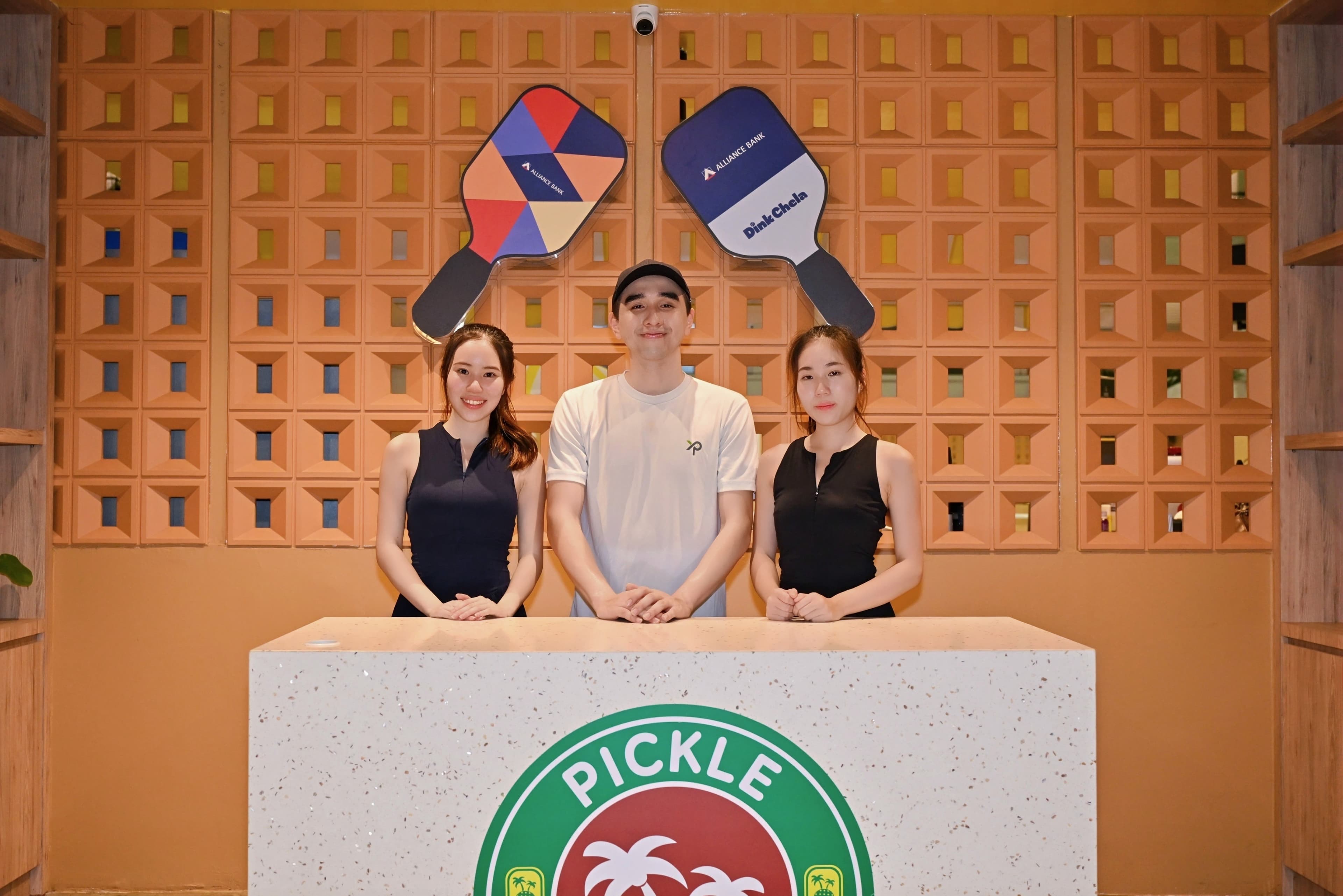 CEO Sports Club guests at the Pickle Land reception counter