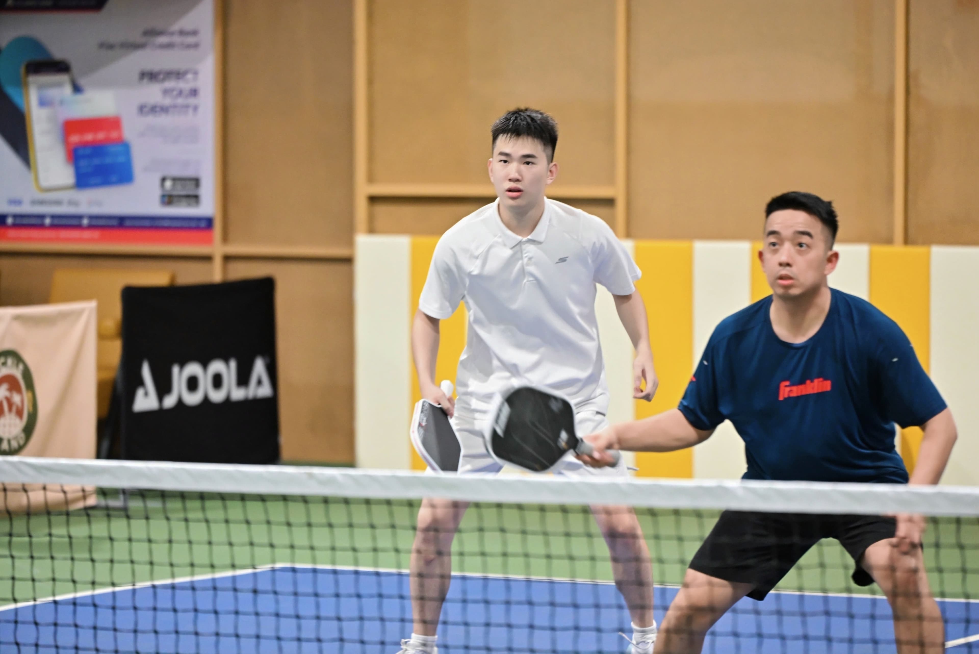 CEO Sports Club players competing at the net