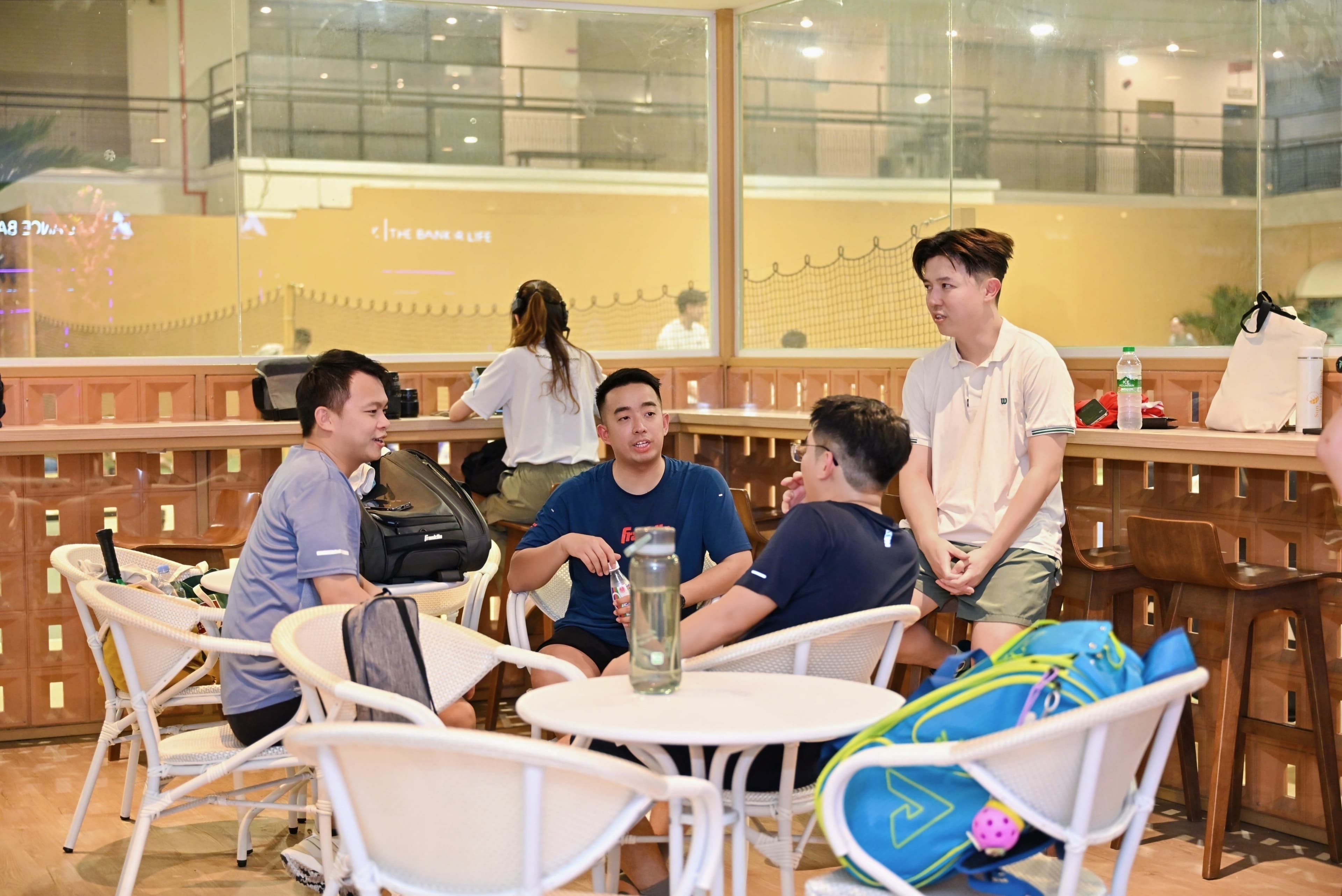 CEO Sports Club guests connecting in the Pickle Land lounge
